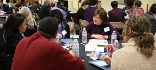 Jennifer Leonard (wearing purple) among other participants at the January 2013 kick-off for Rochester's Facing Race, Embracing Equity project.