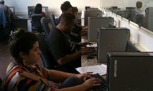 Oakland community members pictured during training as part of Oakland Voices, a program that provides citizens with journalistic skills to produce content for news organizations. 